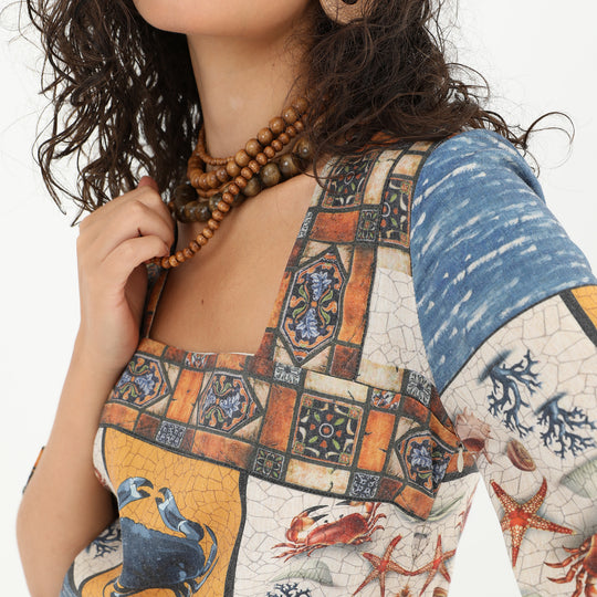Close-up of square neckline and sea print on Midi Tunic Dress
